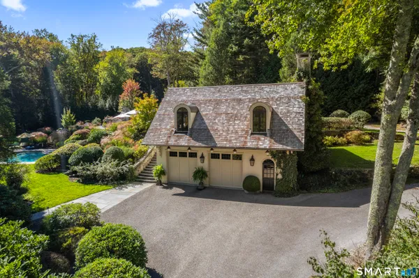 a aerial view of a house with a yard