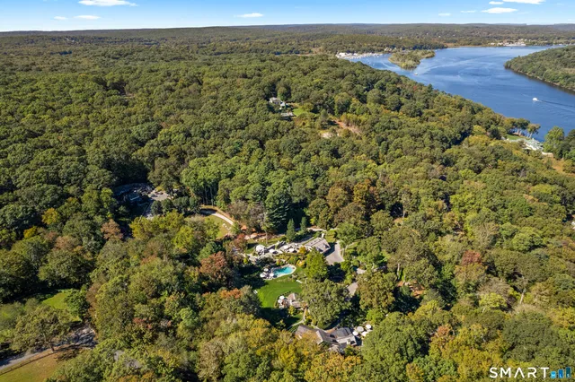 an aerial view of residential house with beach