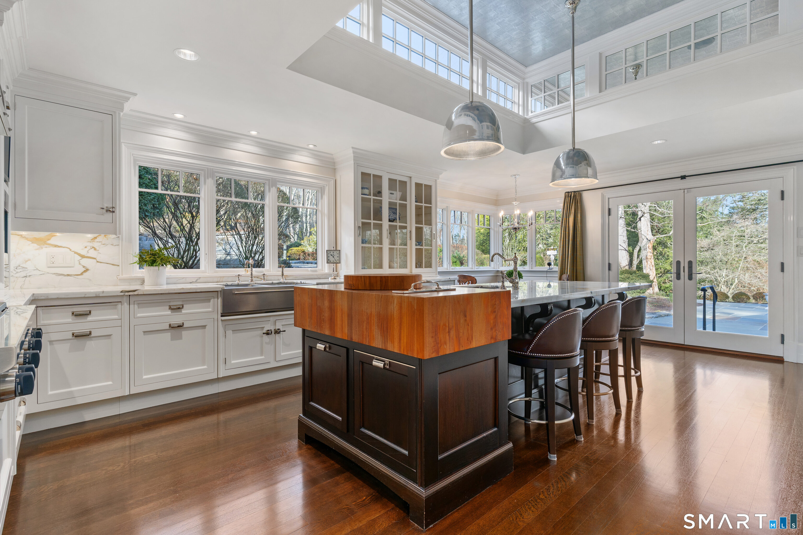 252 River Road Deep River, CT 06417 - Photo 7 of 40 a living room with kitchen island granite countertop furniture a large window and stainless steel appliances