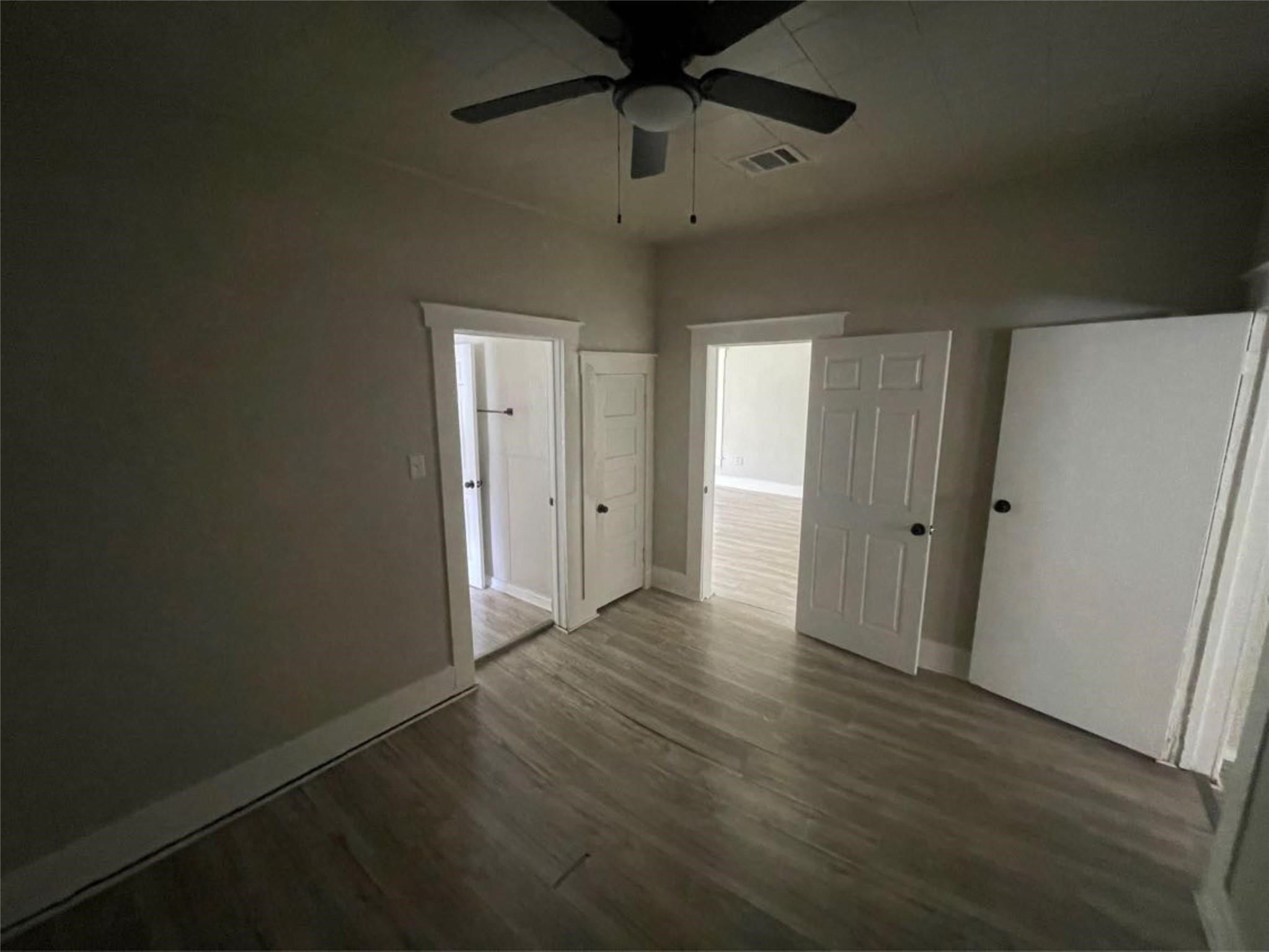 2010 13th Street Port Arthur, TX 77640 - Photo 21 of 22 a view of an empty room with a window