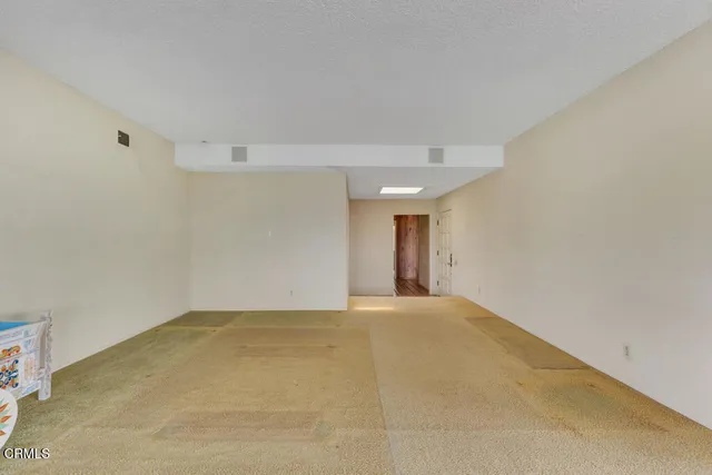 a sitting area with large window