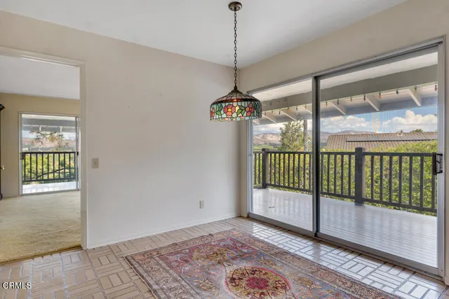 a bathroom with a glass door shower
