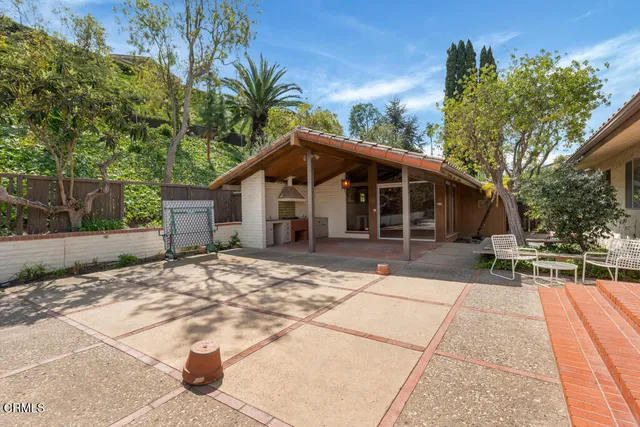a view of a livingroom with a furniture and closet