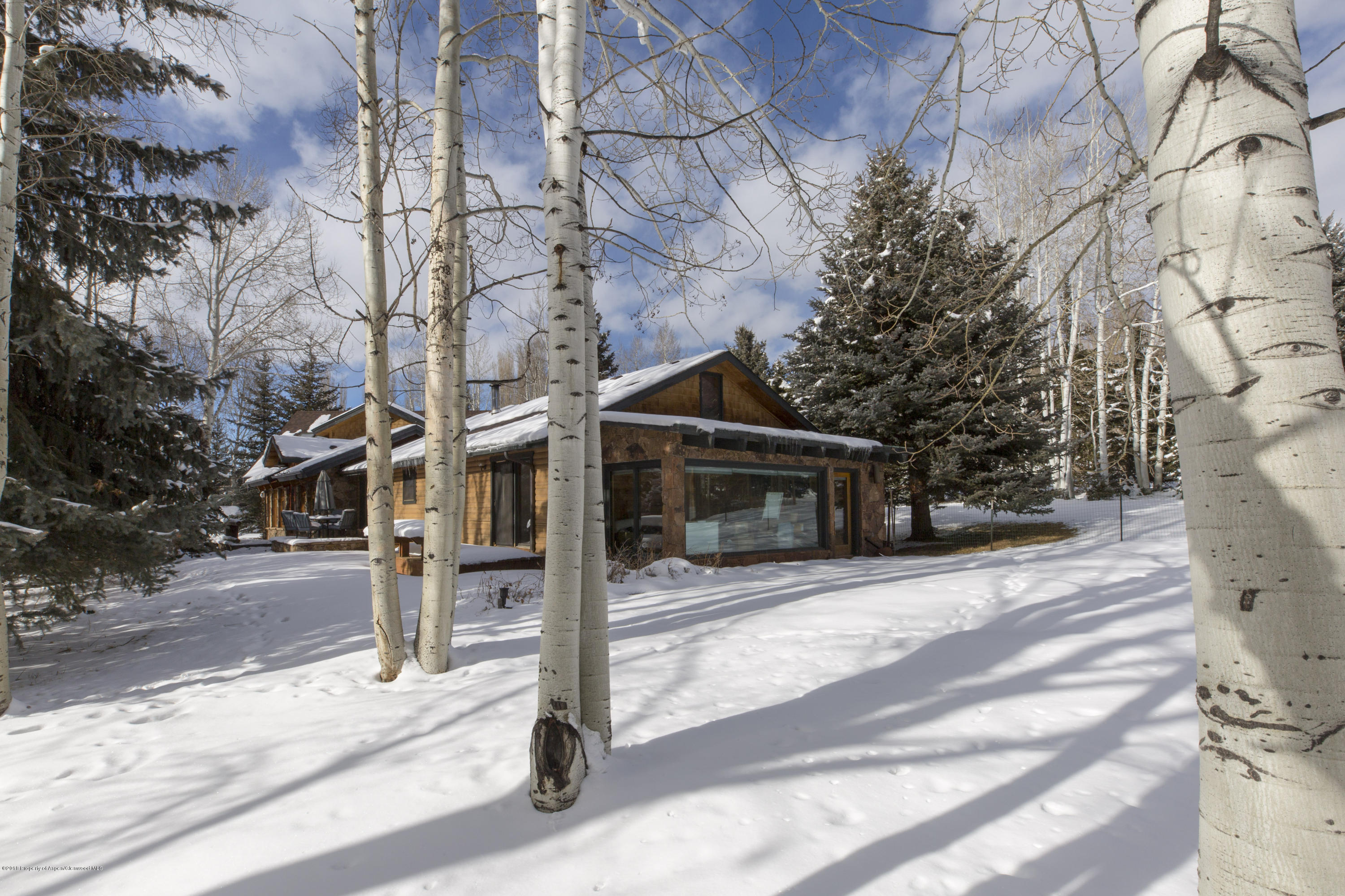 28 Holland Hills Road Basalt, CO 81621 - Photo 21 of 30 a front view of a house with parking