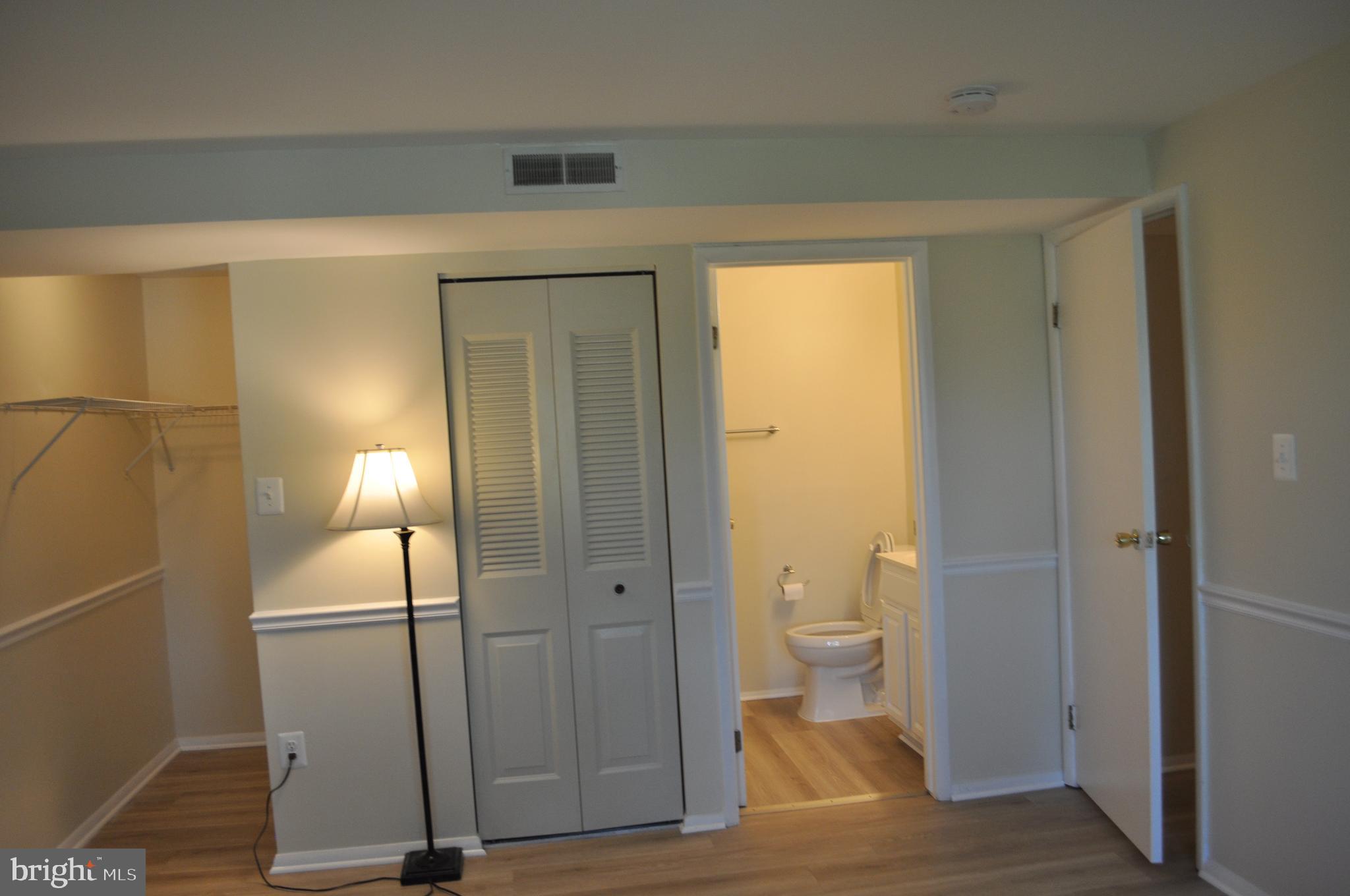 650 Heather Ridge Drive, Unit 12L Frederick, MD 21702 - Photo 11 of 20 a bathroom with a sink and a toilet
