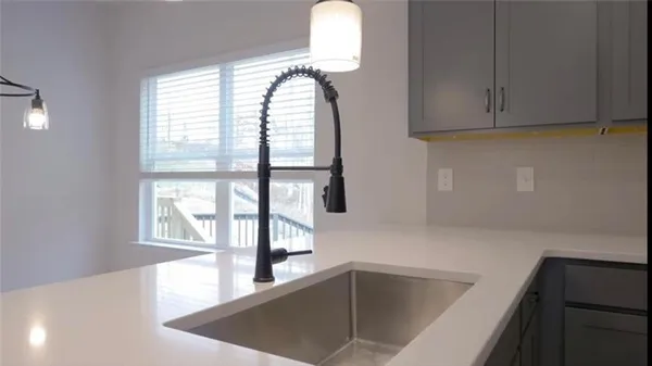 a view of a kitchen with windows