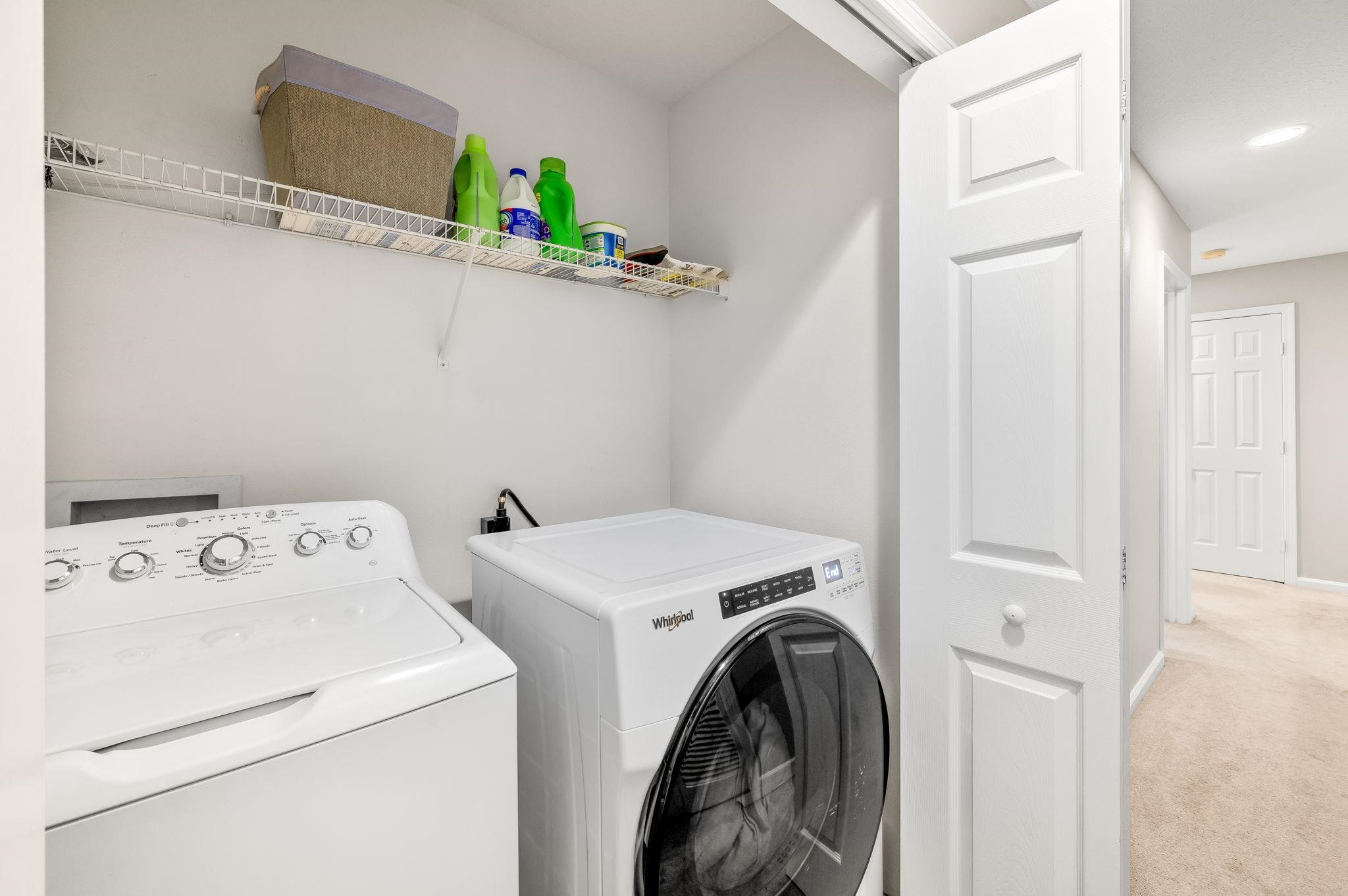 7990 Baymeadows Road East, Unit 1308 Jacksonville, FL 32256 - Photo 19 of 45 a utility room with dryer and washer