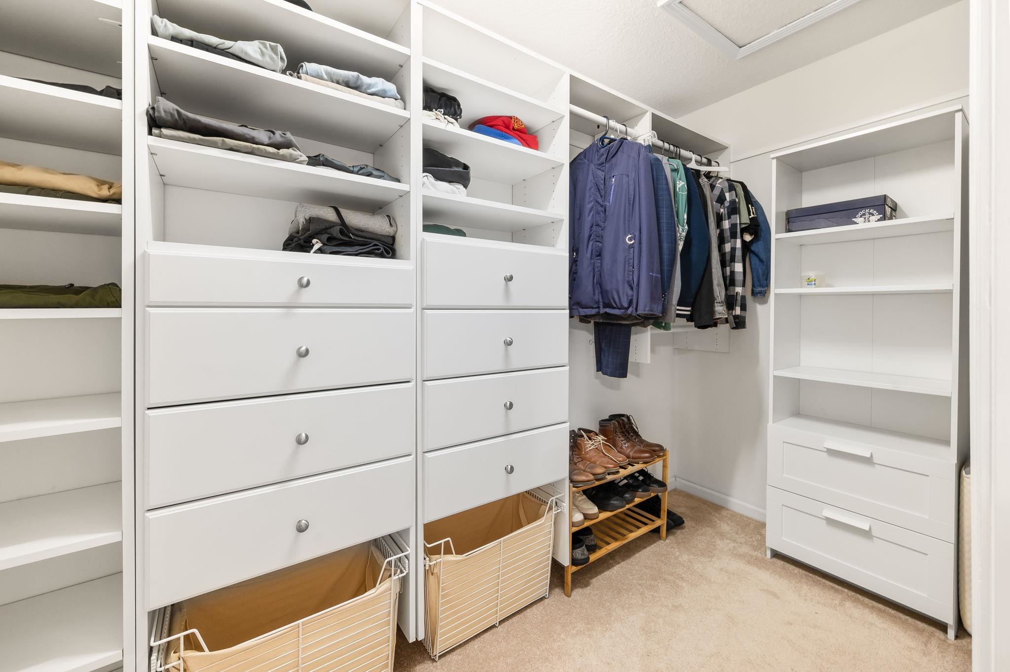 7990 Baymeadows Road East, Unit 1308 Jacksonville, FL 32256 - Photo 29 of 45 a view of walk in closet with clothes and shoes