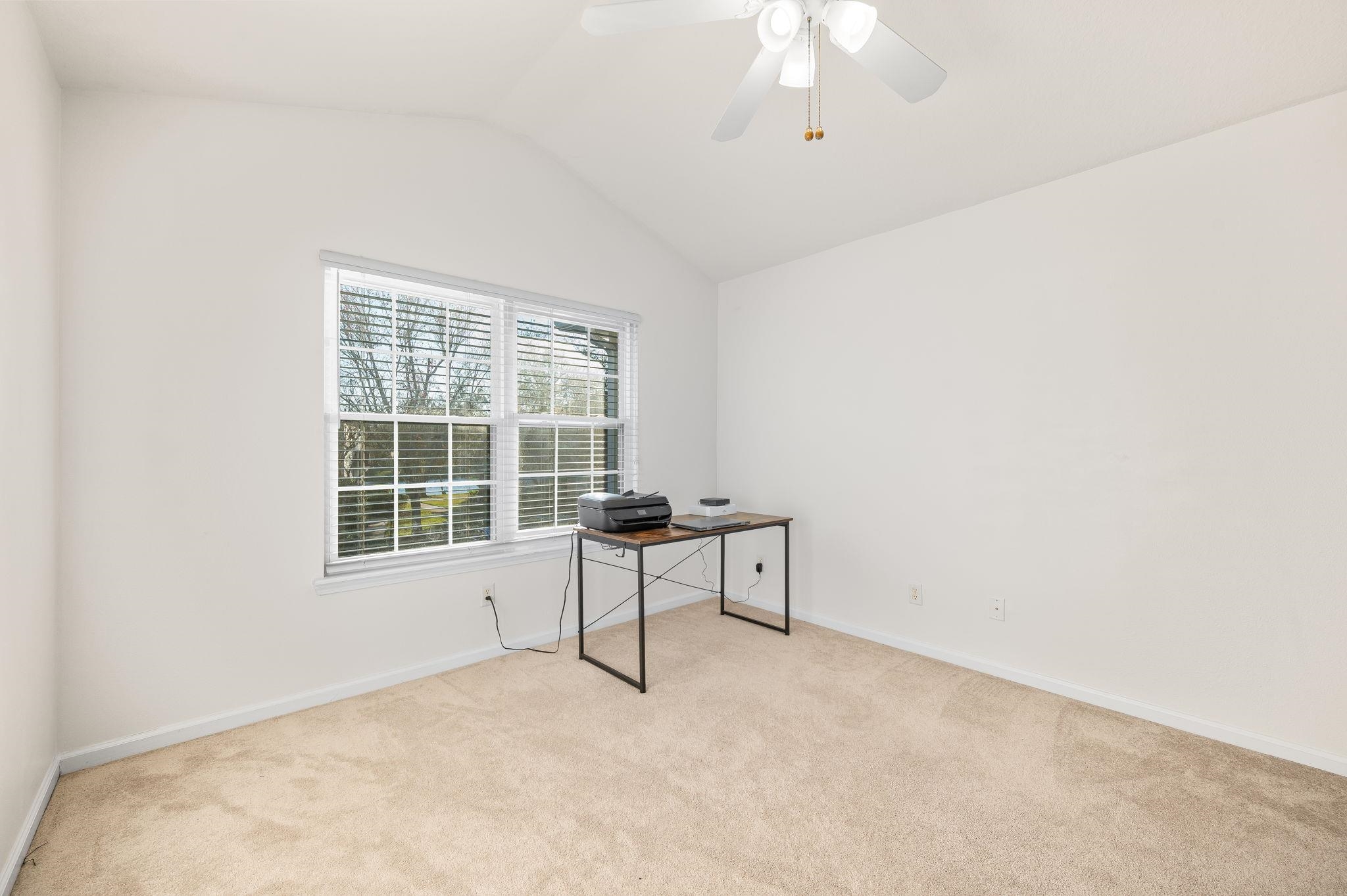 7990 Baymeadows Road East, Unit 1308 Jacksonville, FL 32256 - Photo 33 of 45 an empty room with a window