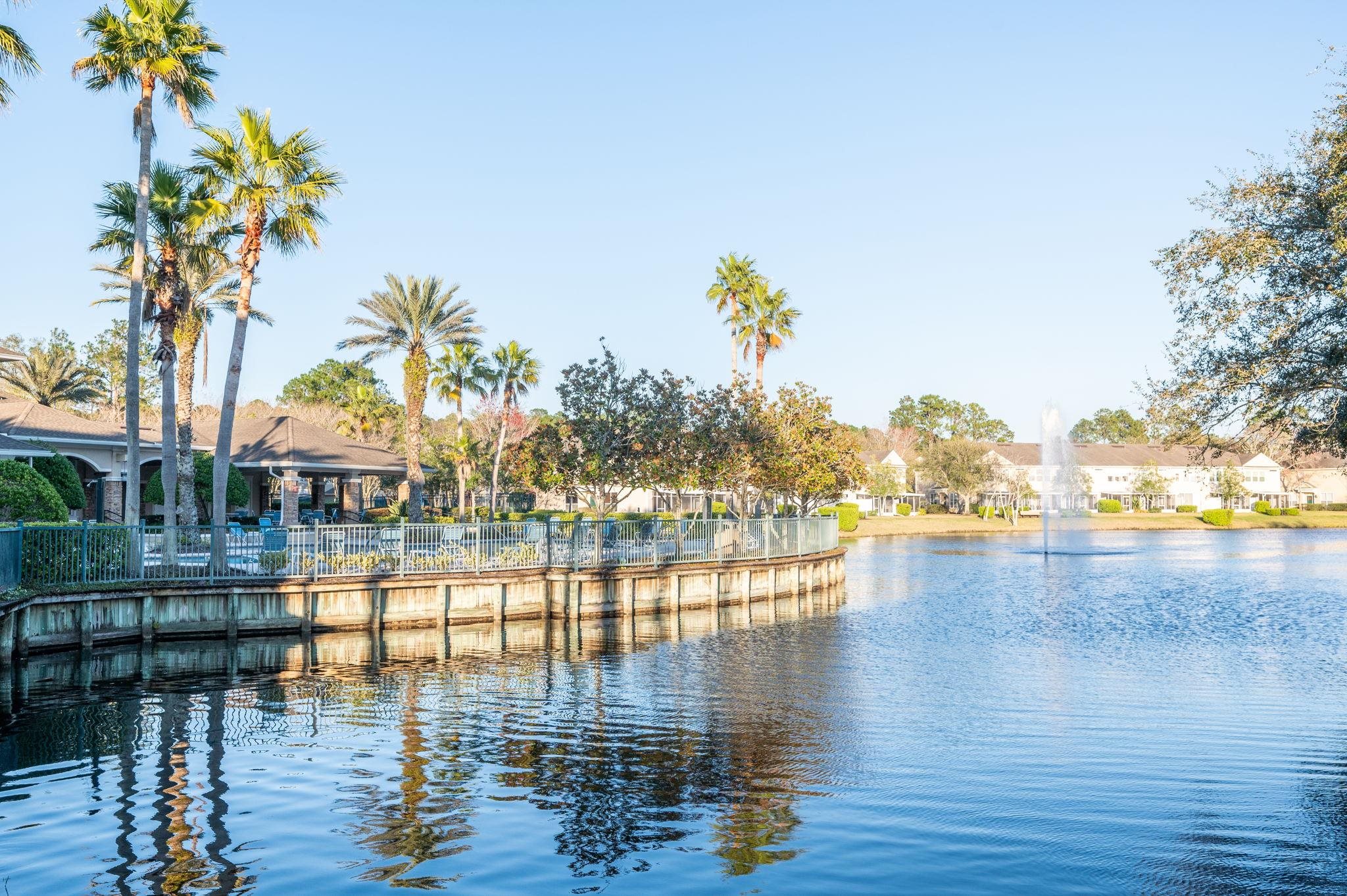 7990 Baymeadows Road East, Unit 1308 Jacksonville, FL 32256 - Photo 42 of 45 a view of a swimming pool and outdoor seating