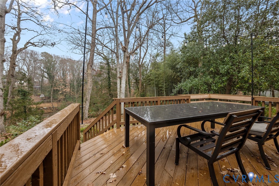 4717 Southmoor Road North Chesterfield, VA 23234 - Photo 39 of 50 a view of a roof deck with wooden fence and floor