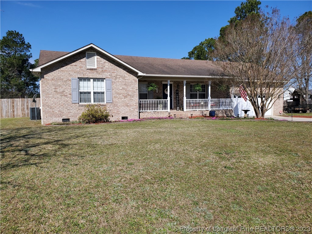 563 Sawyer Road Cameron, NC 28326 - Photo 2 of 43 a front view of a house with a yard
