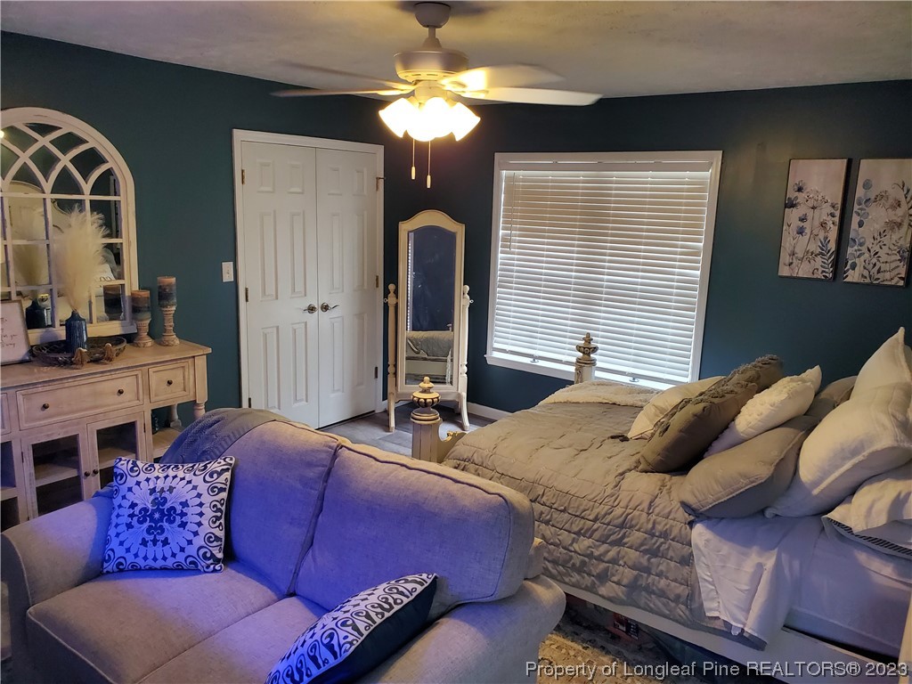 563 Sawyer Road Cameron, NC 28326 - Photo 30 of 43 a bedroom with furniture and a window
