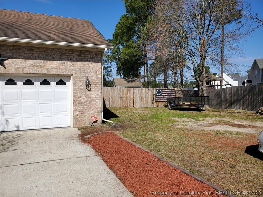 563 Sawyer Road Cameron, NC 28326 - Photo 6 of 43 a view of a street with houses