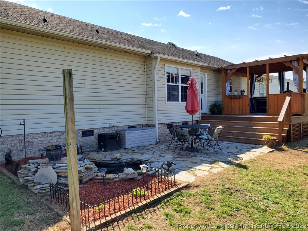 563 Sawyer Road Cameron, NC 28326 - Photo 7 of 43 a view of house with patio outdoor seating