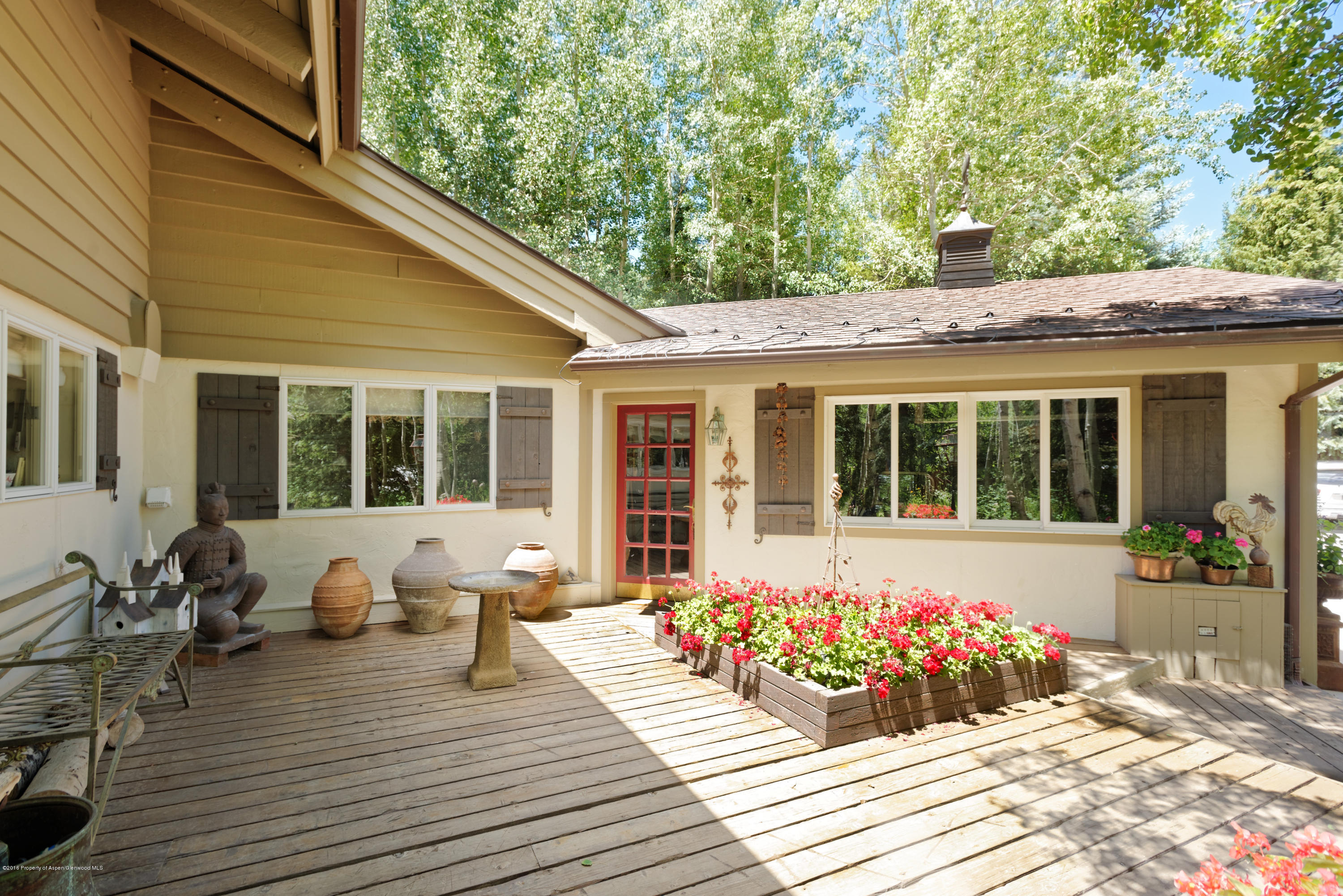 1300 Riverside Drive Aspen, CO 81611 - Photo 2 of 24 a house view with a seating space