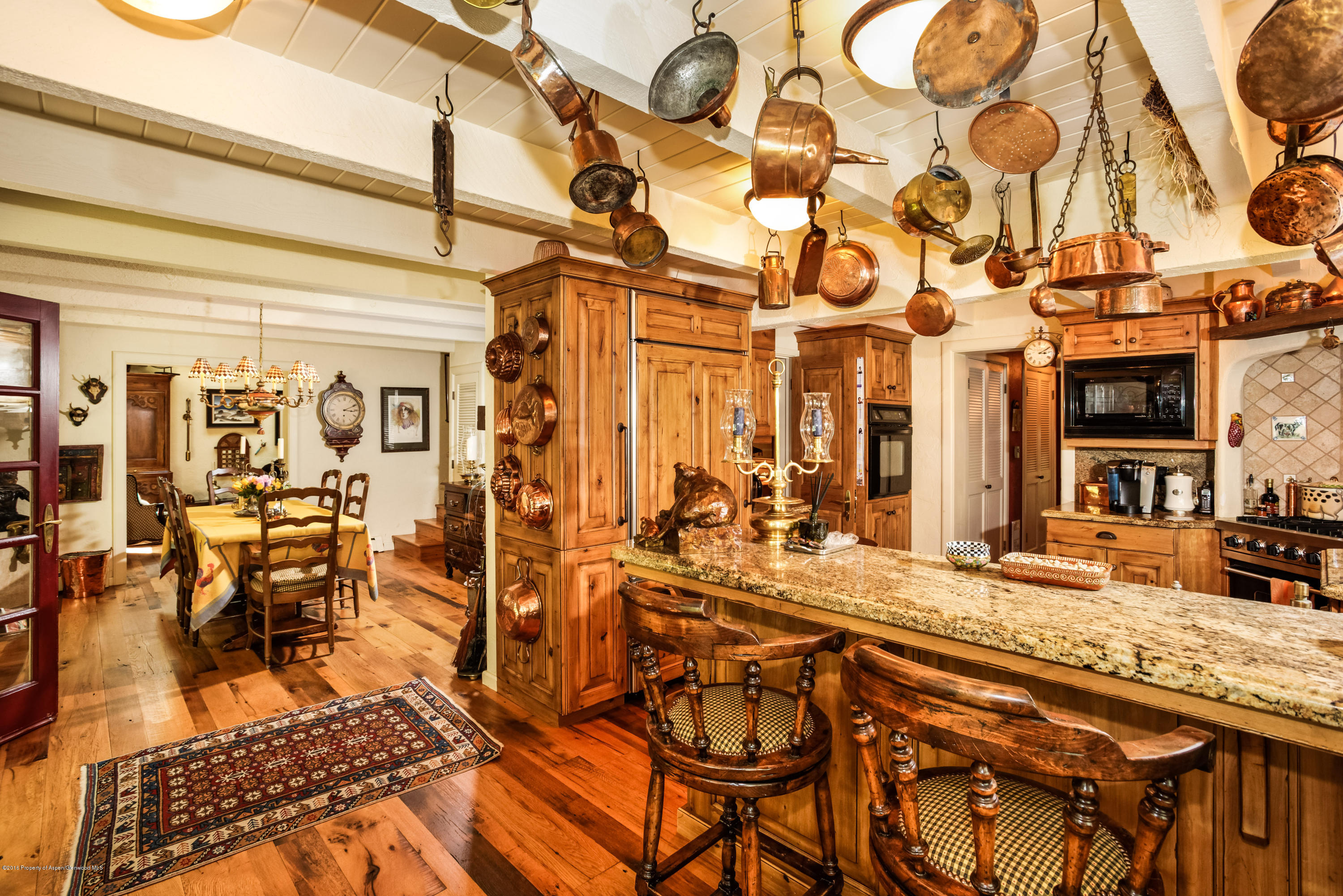 1300 Riverside Drive Aspen, CO 81611 - Photo 5 of 24 a view of a hall with many windows
