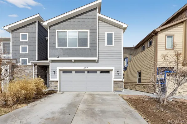 a view of a house with a garage