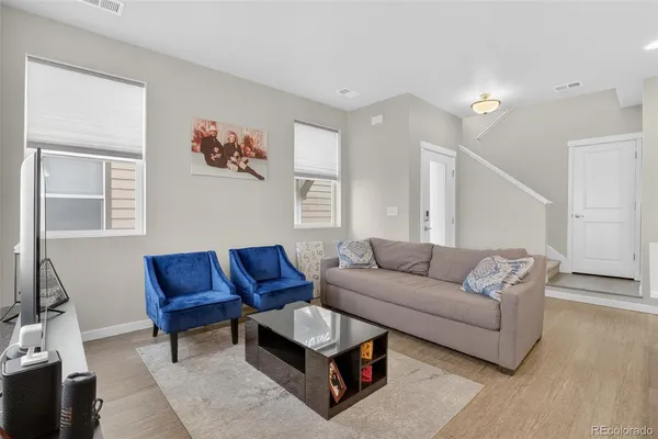 a living room with furniture and a couch
