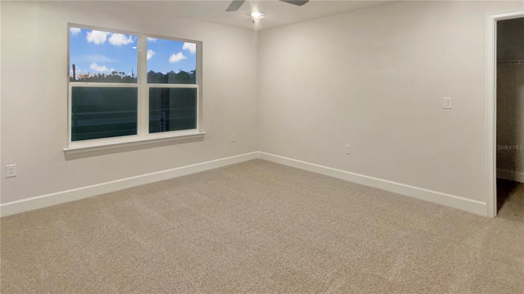 4092 Sagefield Drive Harmony, FL 34773 - Photo 10 of 16 an empty room with a window