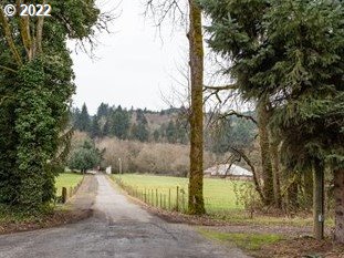 26400 Northwest St Helens Road, Unit 14 Scappoose, OR 97056 - Photo 12 of 15 a view of a yard with large tree