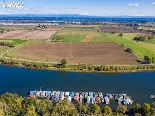 26400 Northwest St Helens Road, Unit 14 Scappoose, OR 97056 - Photo 7 of 15 a view of a city and an ocean