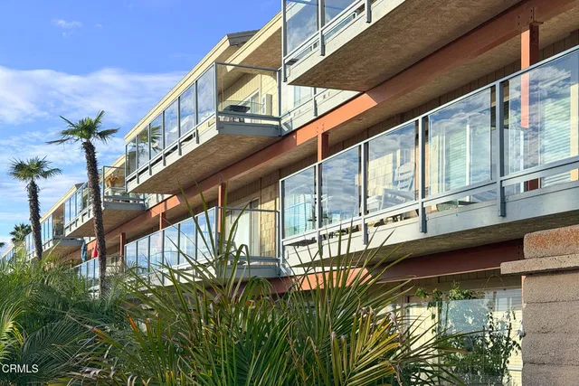 a view of swimming pool with a balcony