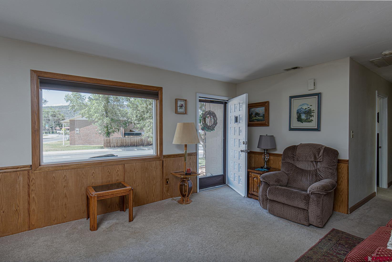 904 Florida Road Durango, CO 81301 - Photo 6 of 20 a living room with furniture and a window