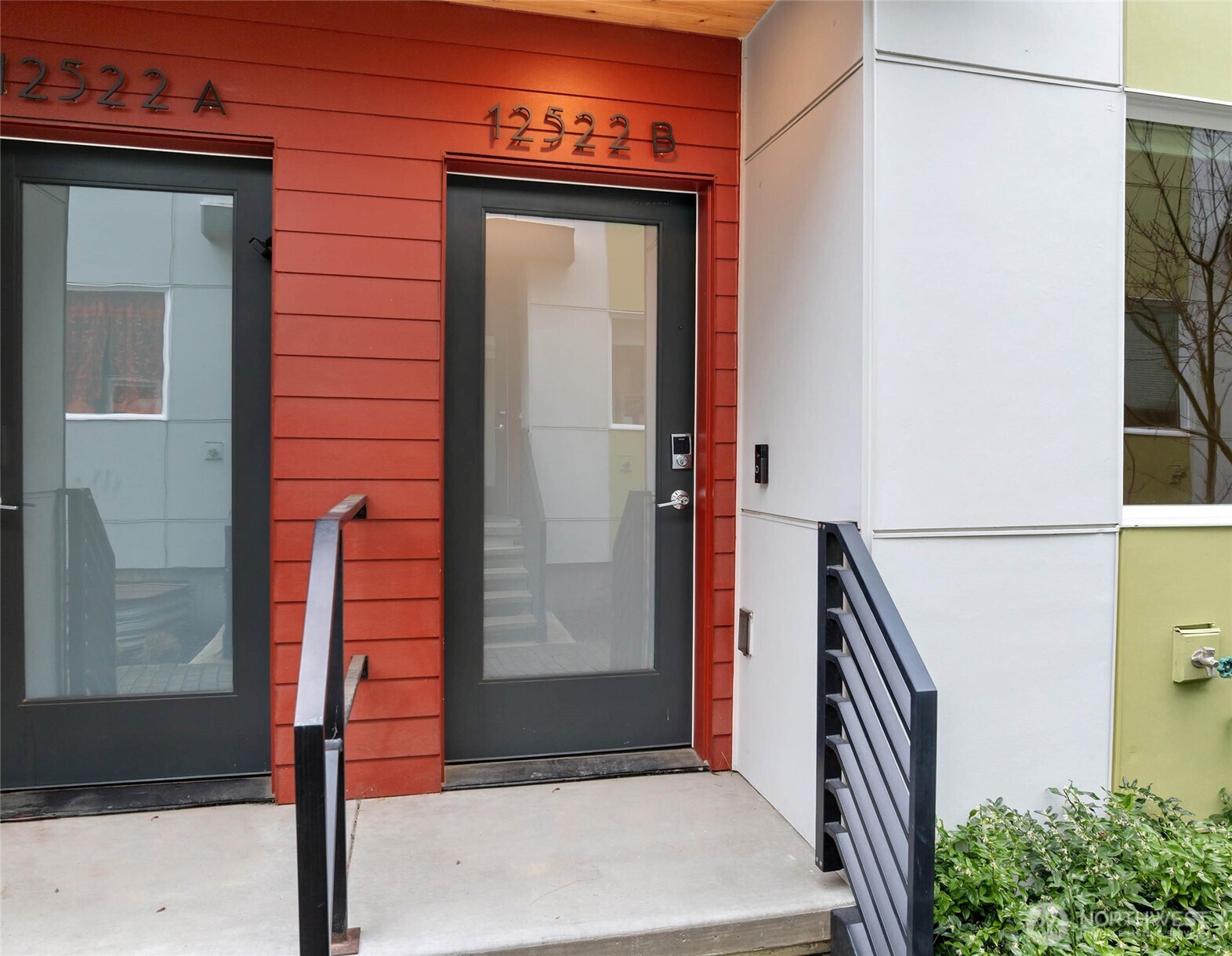 a front view of a house with a garage