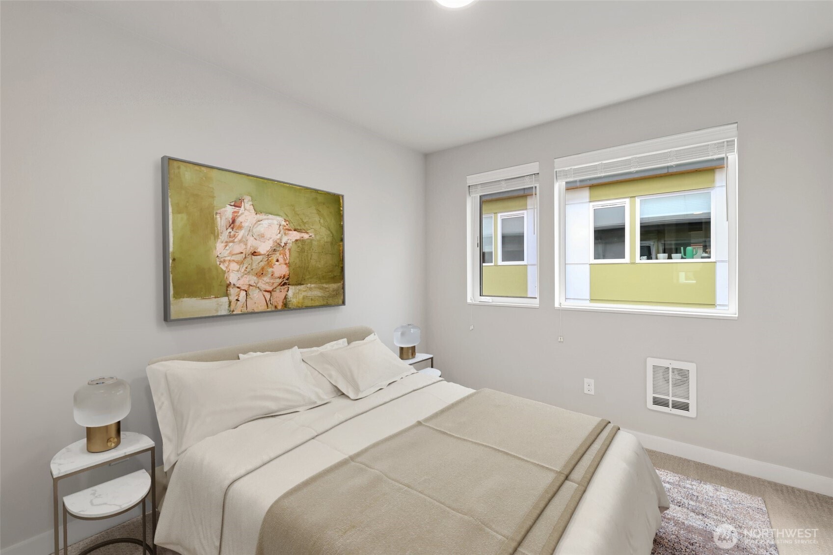 12522 15th Avenue Northeast, Unit B Seattle, WA 98125 - Photo 17 of 40 a bedroom with a bed and a painting on the wall