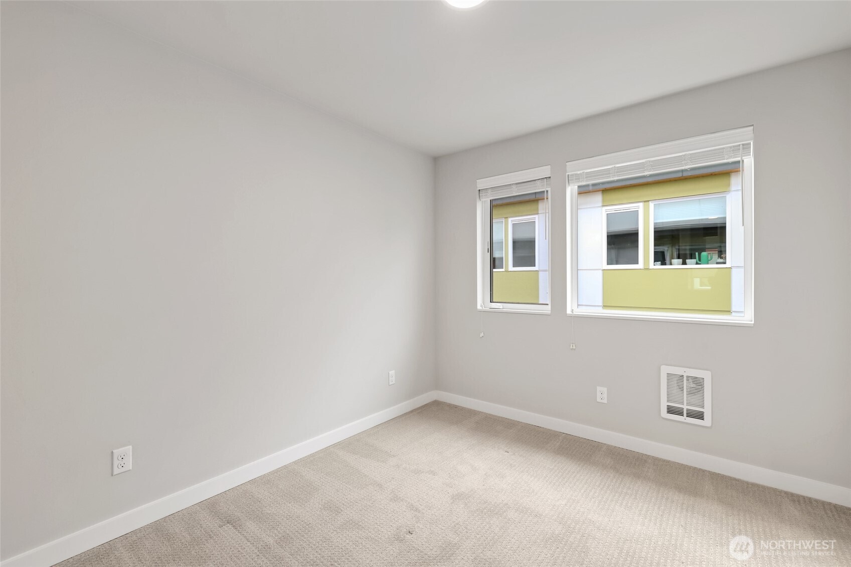 12522 15th Avenue Northeast, Unit B Seattle, WA 98125 - Photo 18 of 40 a view of an empty room with a window