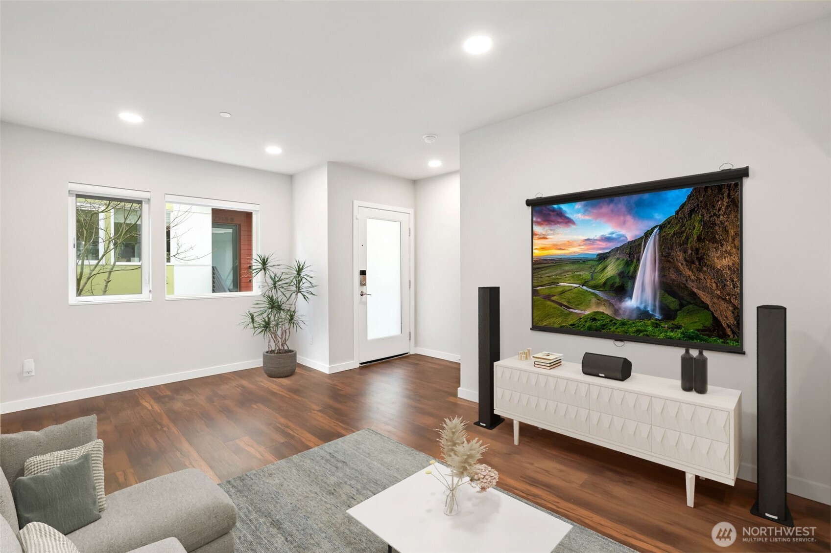 12522 15th Avenue Northeast, Unit B Seattle, WA 98125 - Photo 3 of 40 a living room with furniture and a flat screen tv