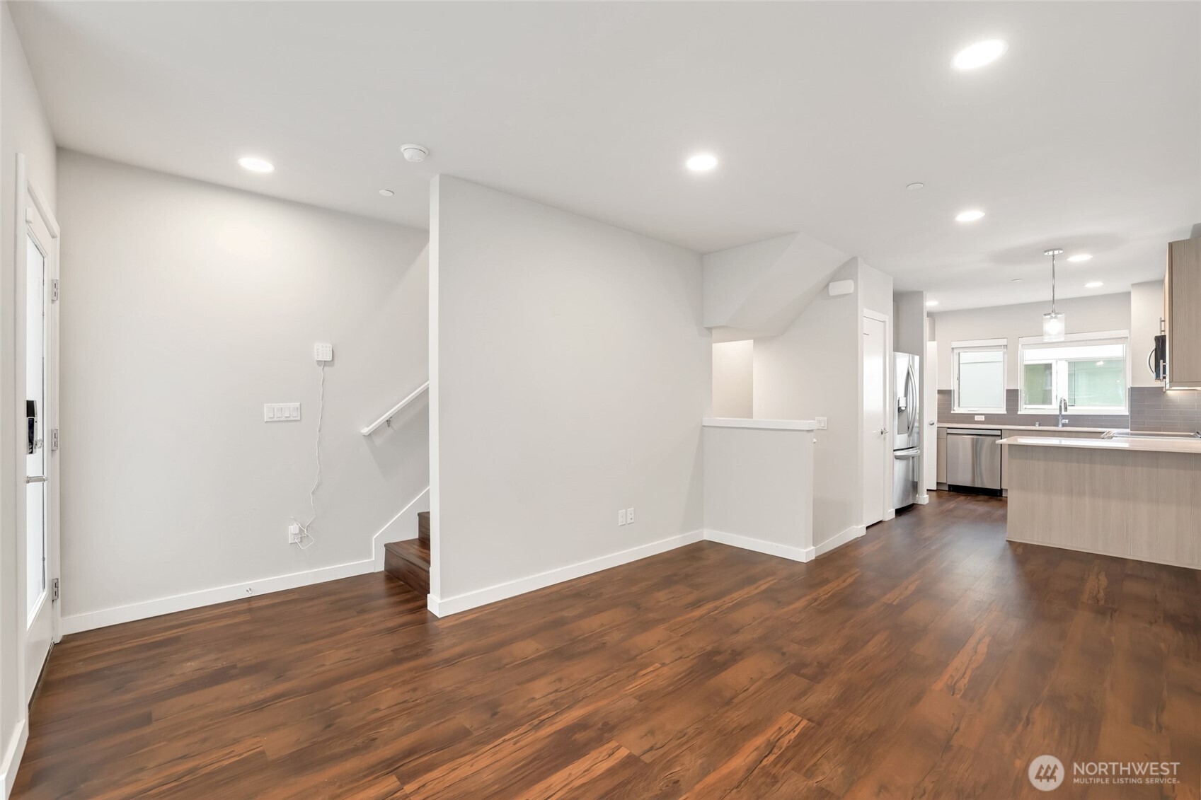 12522 15th Avenue Northeast, Unit B Seattle, WA 98125 - Photo 6 of 40 a view of kitchen with wooden floor