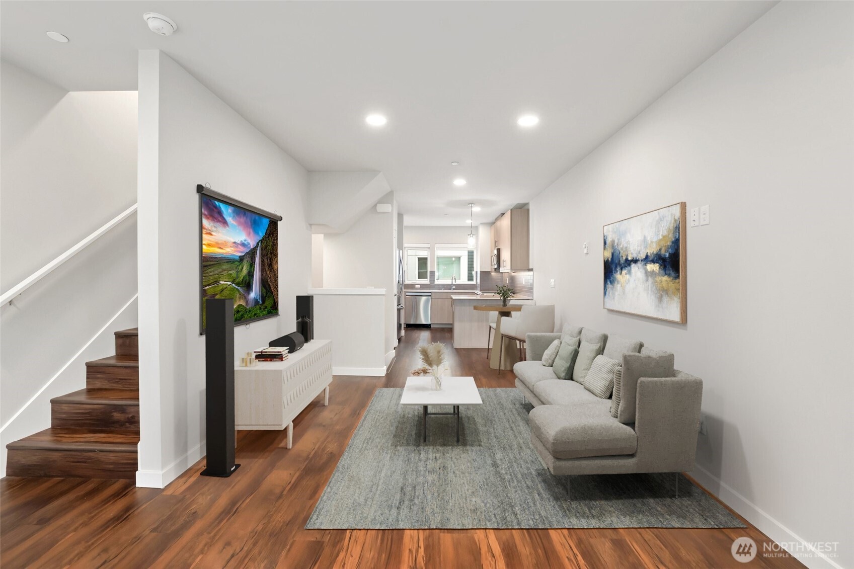 12522 15th Avenue Northeast, Unit B Seattle, WA 98125 - Photo 7 of 40 a living room with furniture and a fireplace