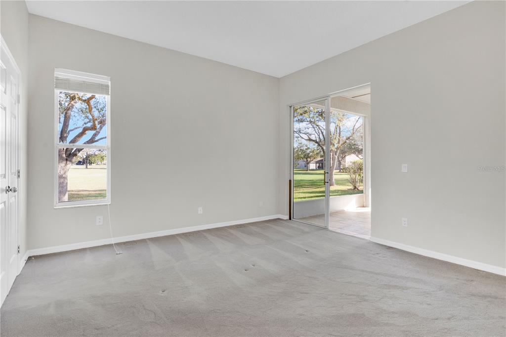 357 Kirkhill Street Ocoee, FL 34761 - Photo 14 of 36 an empty room with windows