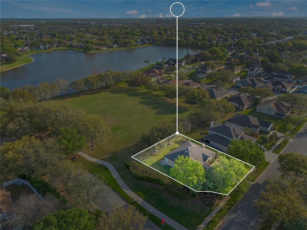 357 Kirkhill Street Ocoee, FL 34761 - Photo 2 of 36 a view of a back yard from a lake view