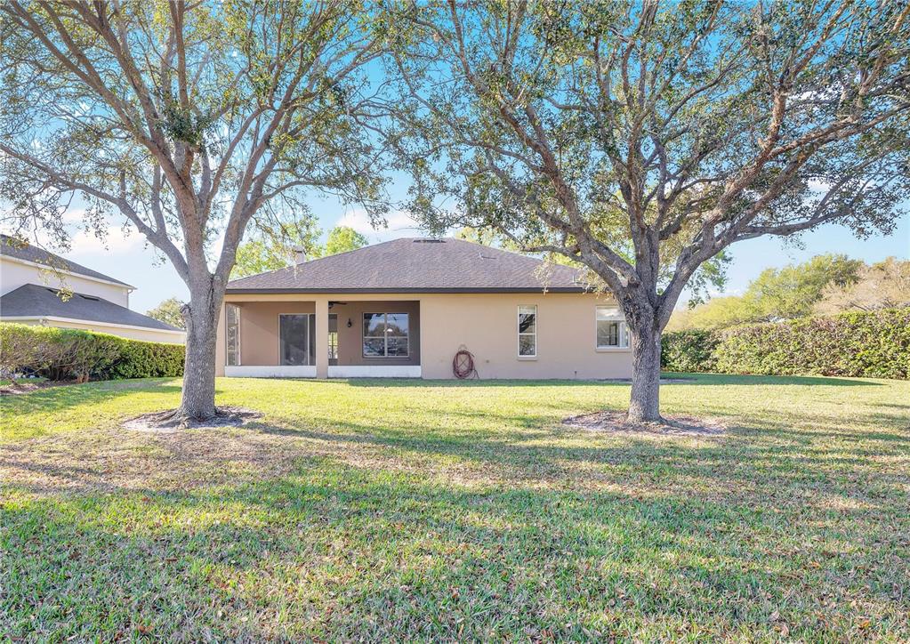 357 Kirkhill Street Ocoee, FL 34761 - Photo 27 of 36 a front view of a house with a yard