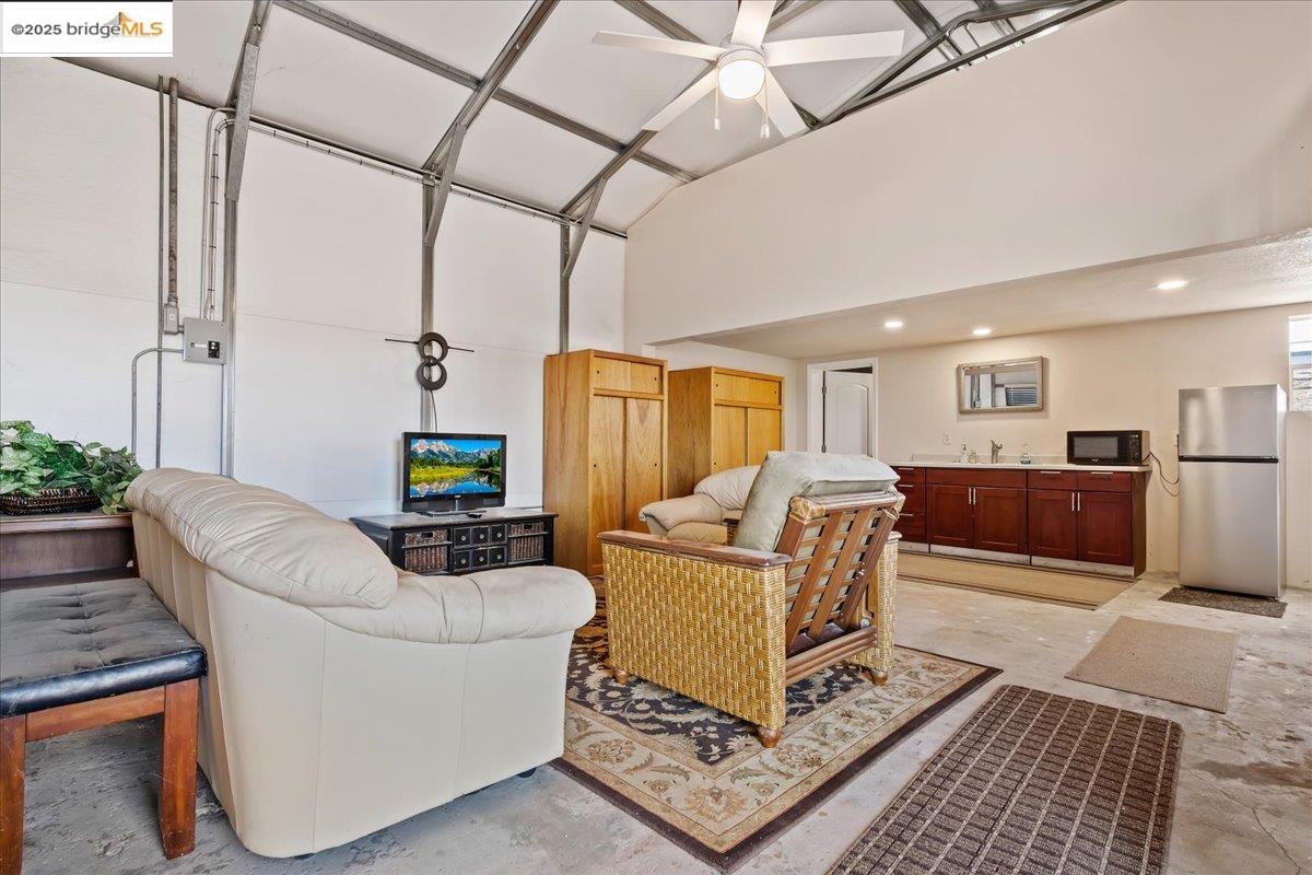 4080 Windsweep Road Bethel Island, CA 94511 - Photo 2 of 18 a living room with furniture and a chandelier