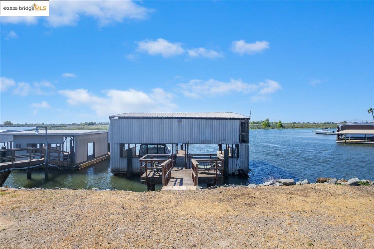 4080 Windsweep Road Bethel Island, CA 94511 - Photo 9 of 18 a view of a house with roof deck