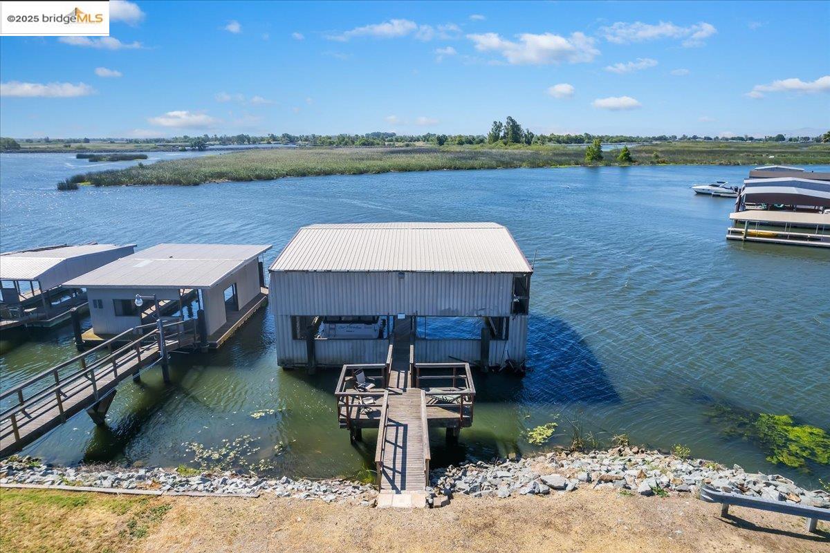 4080 Windsweep Road Bethel Island, CA 94511 - Photo 10 of 18 a view of a lake with a terrace
