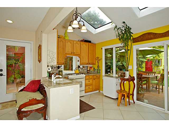 576 Hermes Avenue Encinitas, CA 92024 - Photo 5 of 19 a very nice looking dining room with a large kitchen island in the center