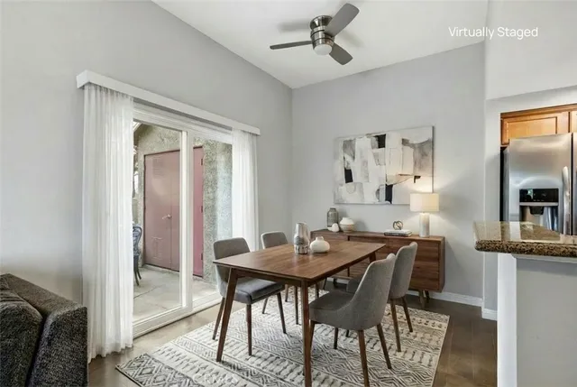 a view of a dining room with furniture