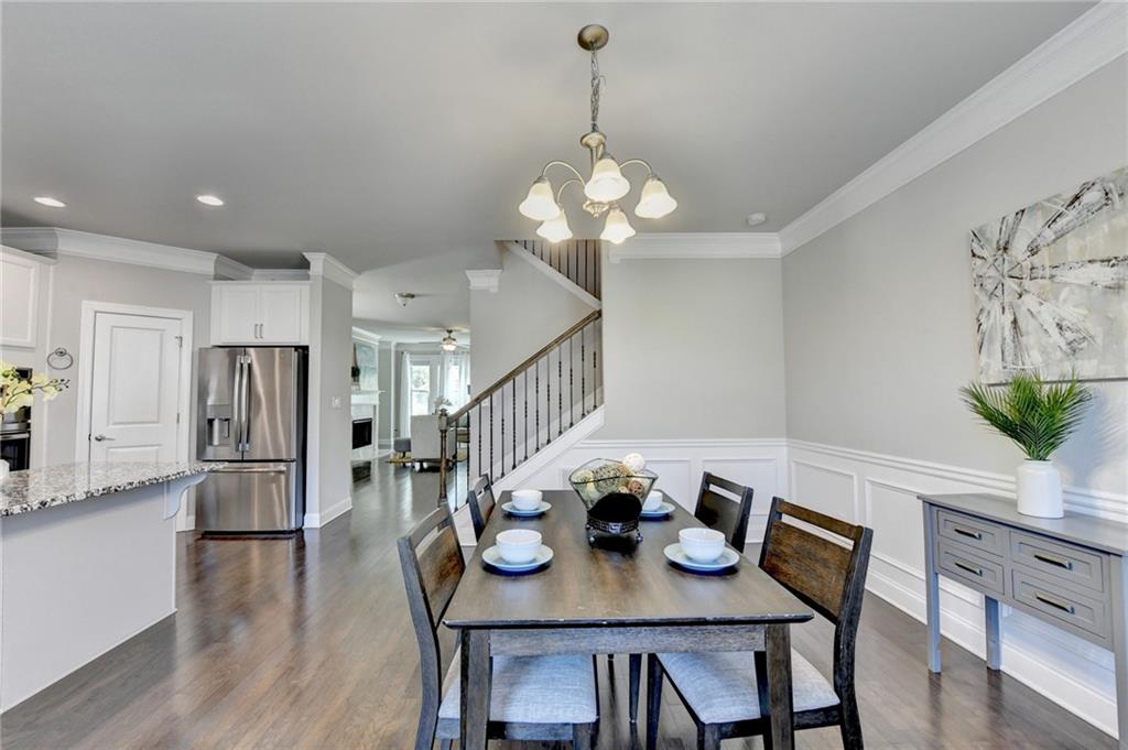 4158 Butler Drive Atlanta, GA 30341 - Photo 22 of 65 a view of a dining room with furniture and wooden floor