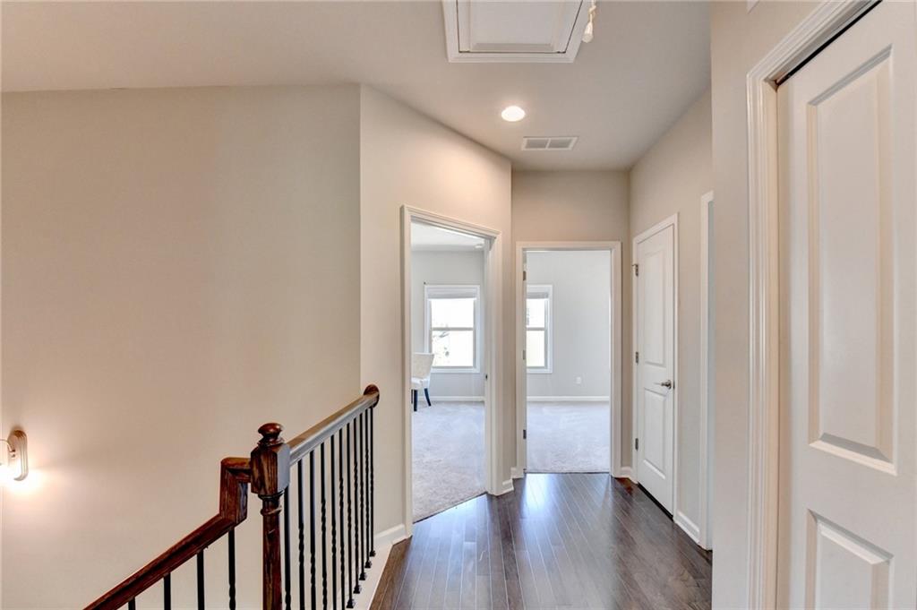 4158 Butler Drive Atlanta, GA 30341 - Photo 35 of 65 a view of a hallway with wooden floor