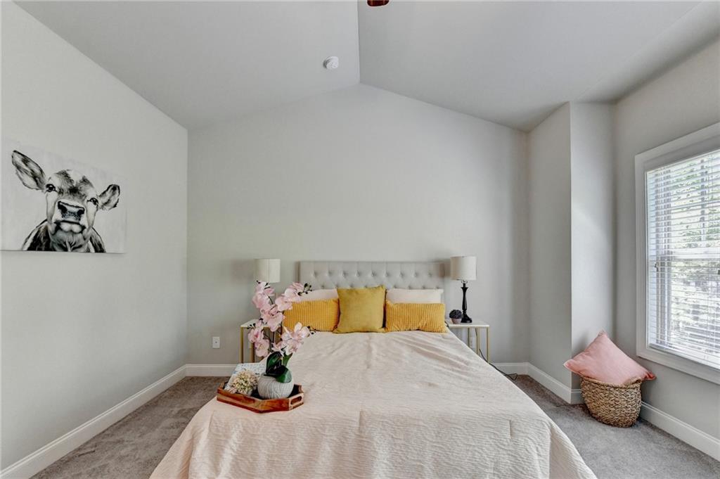 4158 Butler Drive Atlanta, GA 30341 - Photo 39 of 65 a bedroom with a bed and a window