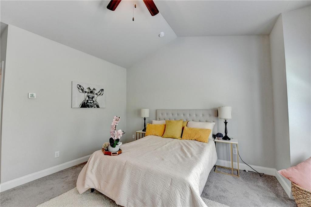 4158 Butler Drive Atlanta, GA 30341 - Photo 40 of 65 a bedroom with a bed and a window