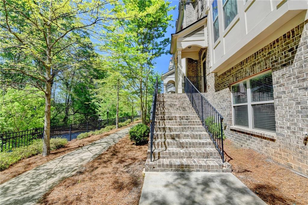 4158 Butler Drive Atlanta, GA 30341 - Photo 4 of 65 a view of a pathway of a house with backyard and garden
