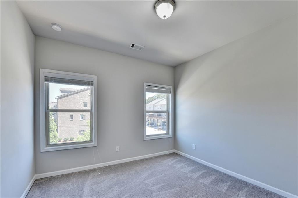 4158 Butler Drive Atlanta, GA 30341 - Photo 53 of 65 an empty room with windows