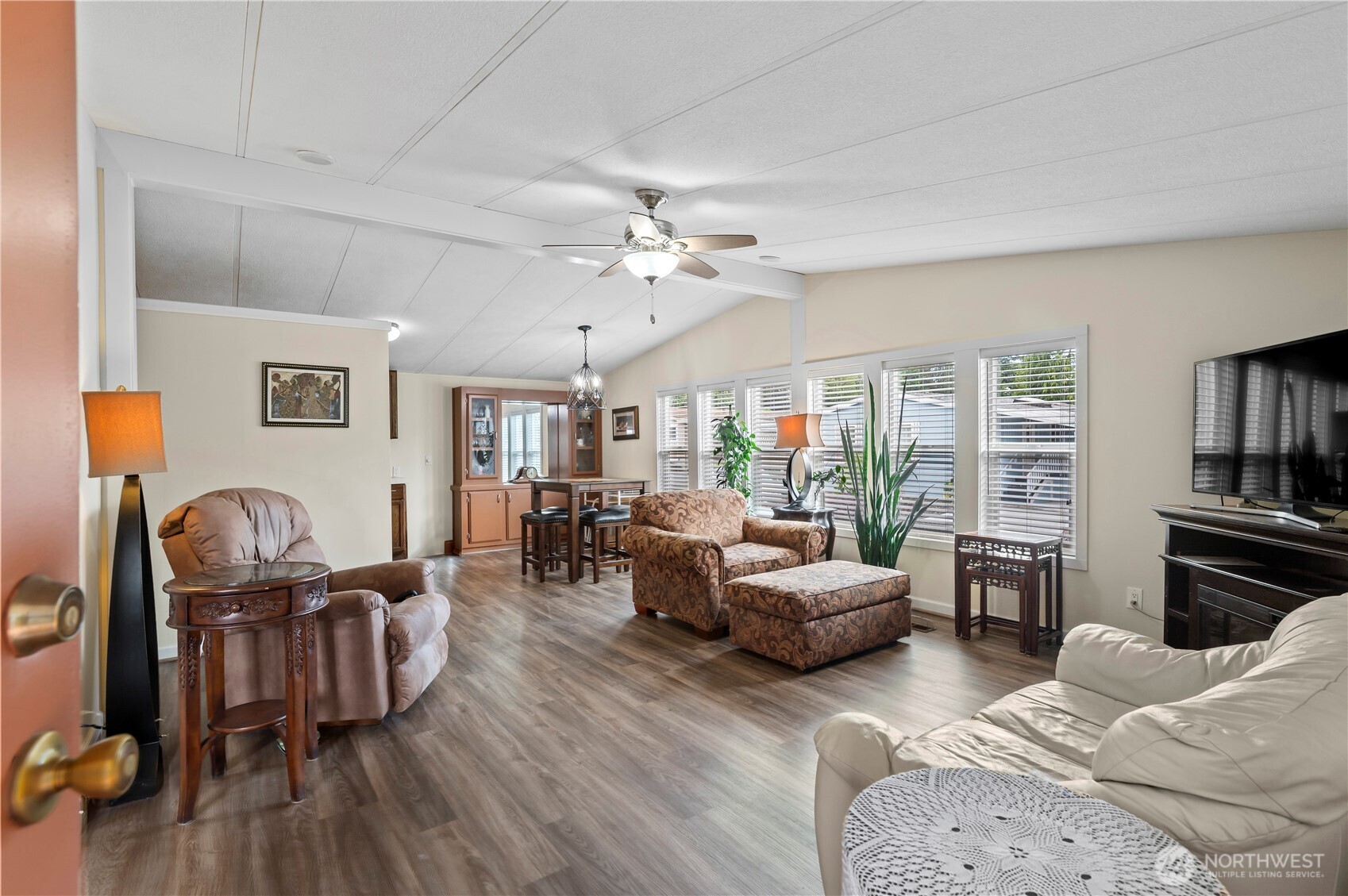 1427 100th Street Southwest, Unit 145 Everett, WA 98204 - Photo 17 of 36 a living room with furniture or couch and a wooden floor