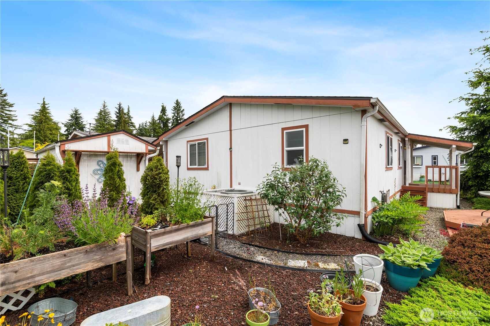 1427 100th Street Southwest, Unit 145 Everett, WA 98204 - Photo 33 of 36 a house view with a garden space